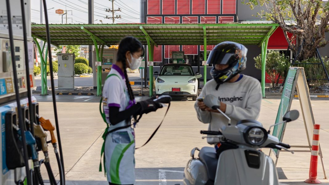 High oil prices drive a surge in Chinese electric vehicle sales, but charging networks lag behind